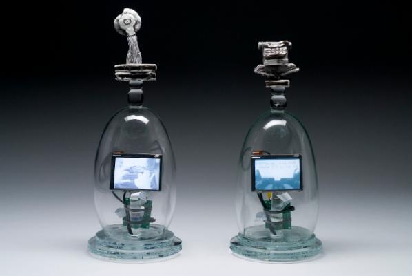 Tim Tate, Virtual Novelist, 2008. Blown and cast glass, electronic components, original video. Courtesy of the artist. Photo: Anything Photographic.