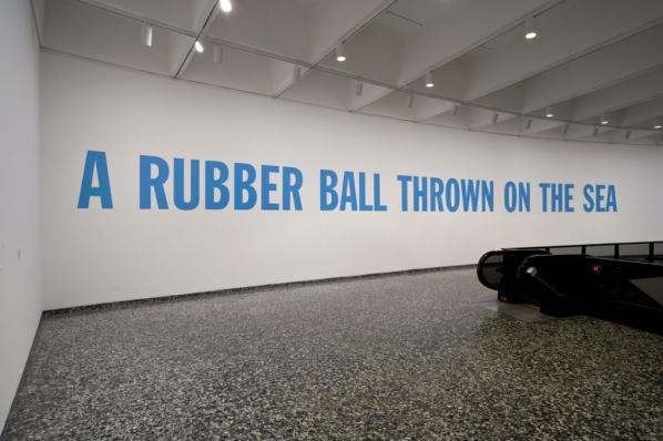 Lawrence Weiner. A RUBBER BALL THROWN ON THE SEA, Cat. No. 146, 1969 Text on wall variable. Joseph H. Hirshhorn Purchase Fund, 2007. The Panza Collection.