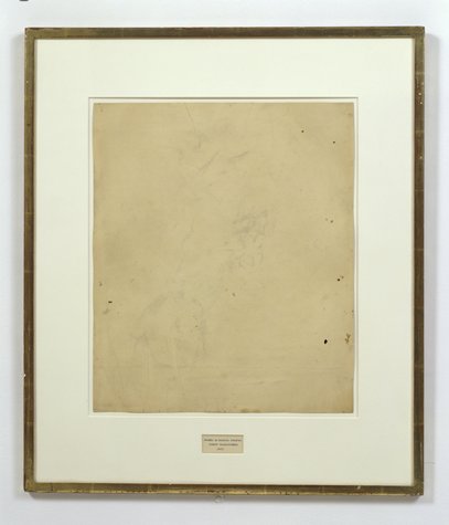 Robert Rauschenberg, Erased de Kooning Drawing, 1953;  drawing; traces  of ink and crayon on paper, mat, label, and gilded frame, 25 1/4 in. x 21 3/4 in. x 1/2 in. (64.14 cm x 55.25 cm x 1.27 cm); Collection SFMOMA.