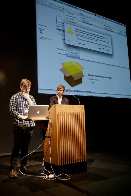 Gainsing's opening speech + artist jon.satrom, transmediale 2k+12 © Genz Lidner