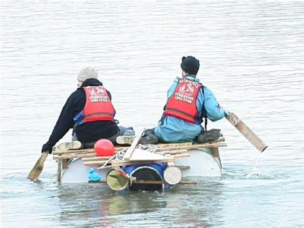 Heath Bunting and collaborators crossing the Rhine river on self-made raft, Germany