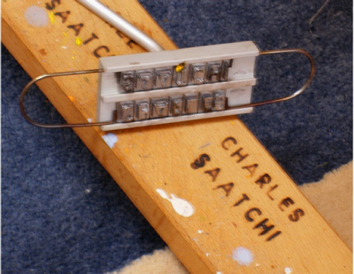 The Charles Saatchi branding iron is a limited edition work of art conceived by John A Walker.﻿