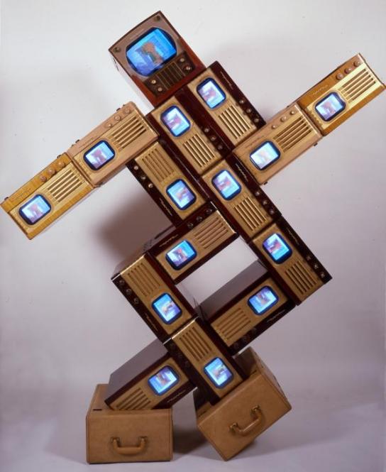 Nam June Paik, "Merce/Digital," 1988 single-channel video sculpture with vintage television cabinets and fifteen monitors; color, silent, collection of Roselyne Chroman Swig, Copyright Nam June Paik Estate. (Image courtesy Nam June Paik Estate)﻿