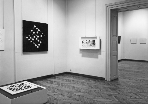 First New Tendencies exhibition, 1961. Exhibition view: b 256 and b 36 by Paul Talman (1961; floor and wall); Julio Le Parc, Probabilité Du Noir Égal Au Blanc N° 4 (Probability of Black Being Equal to White No. 4) (1961), wall, right side. Courtesy Museum of Contemporary Art, Zagreb; copyright © Bildrecht.﻿