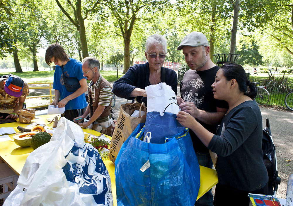 Image credit: Shu Lea Chung exchanging seeds with the community at the Seeds Underground party. Photo by Pau Ros.