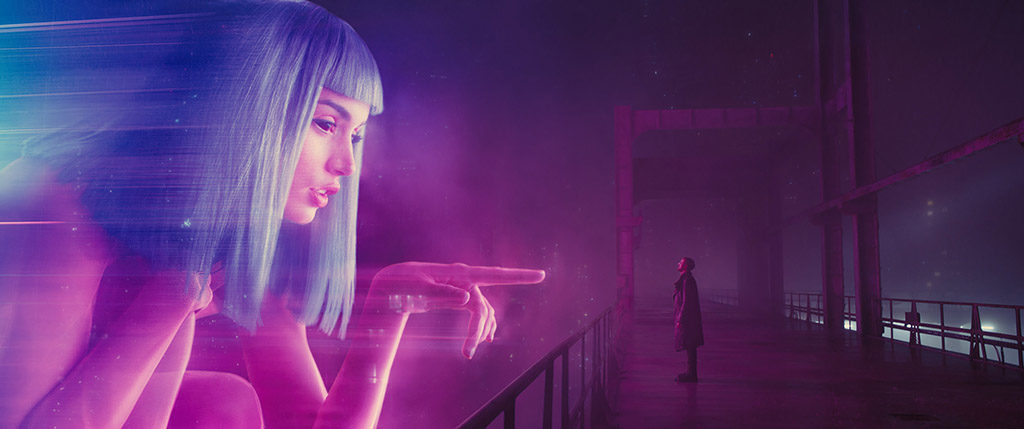 A larger-than-life commercial featuring a black-eyed avatar of Joi’s character, Blade Runner 2049﻿