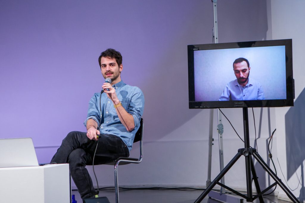 Rafael Goldzweig and Mikheil Benidze (screen) during the panel "Misinformation on Social Media during Elections"